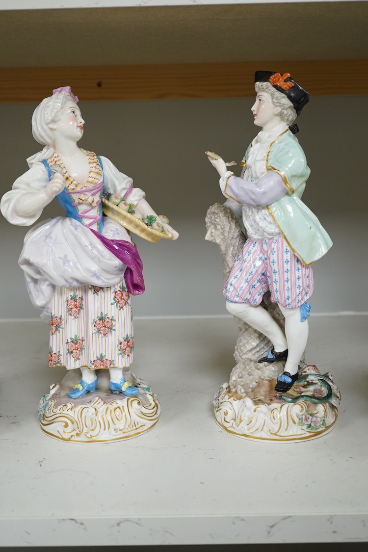 A pair of 19th century Volkstedt porcelain figures,31cm high